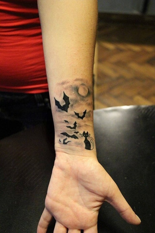 Bats and black cat with moon tattoos