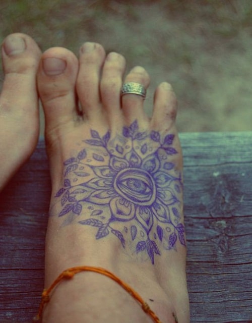 Eye Tattoo on Foot with Petals and Leaves