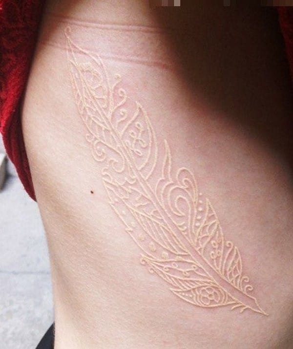 105 Best Feather Tattoo Ideas and Meanings 2023  the daily glimmer