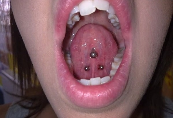Web Tongue Piercing With Surface Barbell