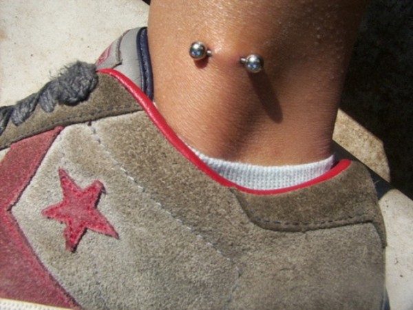 Leg Piercing With Silver Barbell