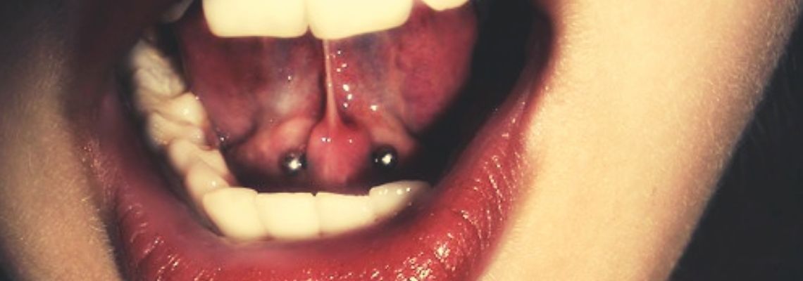tongue web piercing