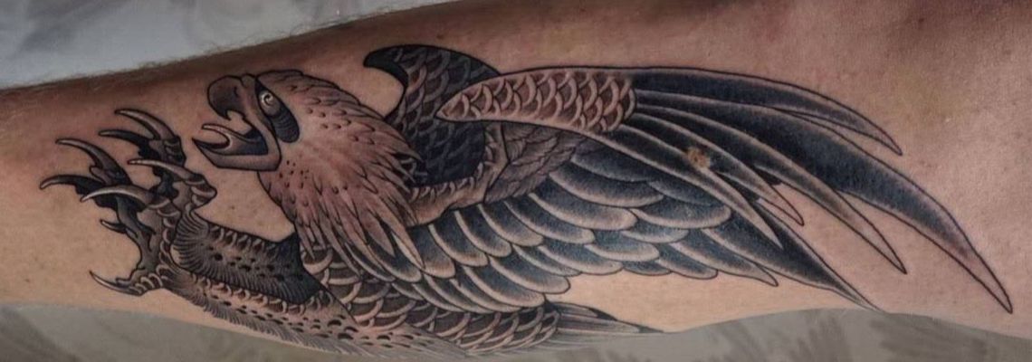 Incredible black and grey eagle tattoo on arm